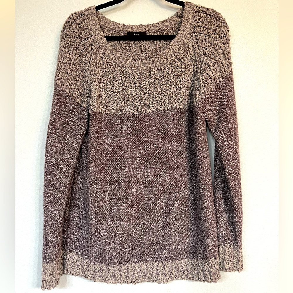 Purple and cream woven sweater. Looks great with jeans or slacks.